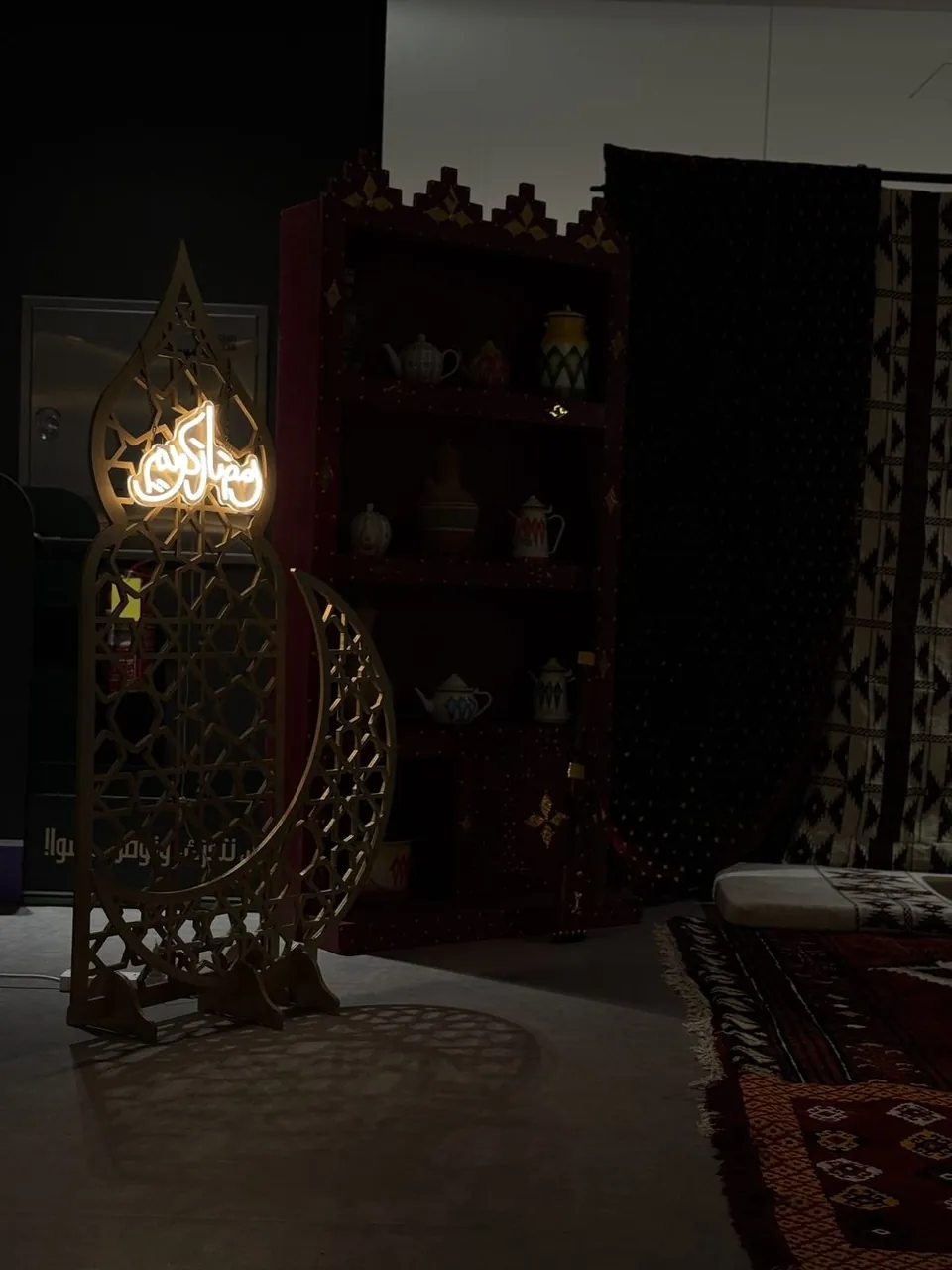 Traditional corner with lantern and heritage shelves at night